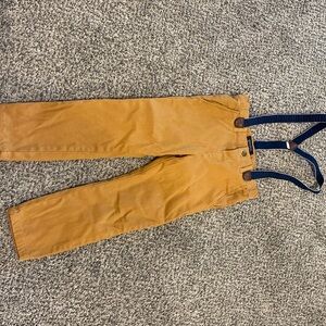 Mayoral brown corduroy pants with suspenders.